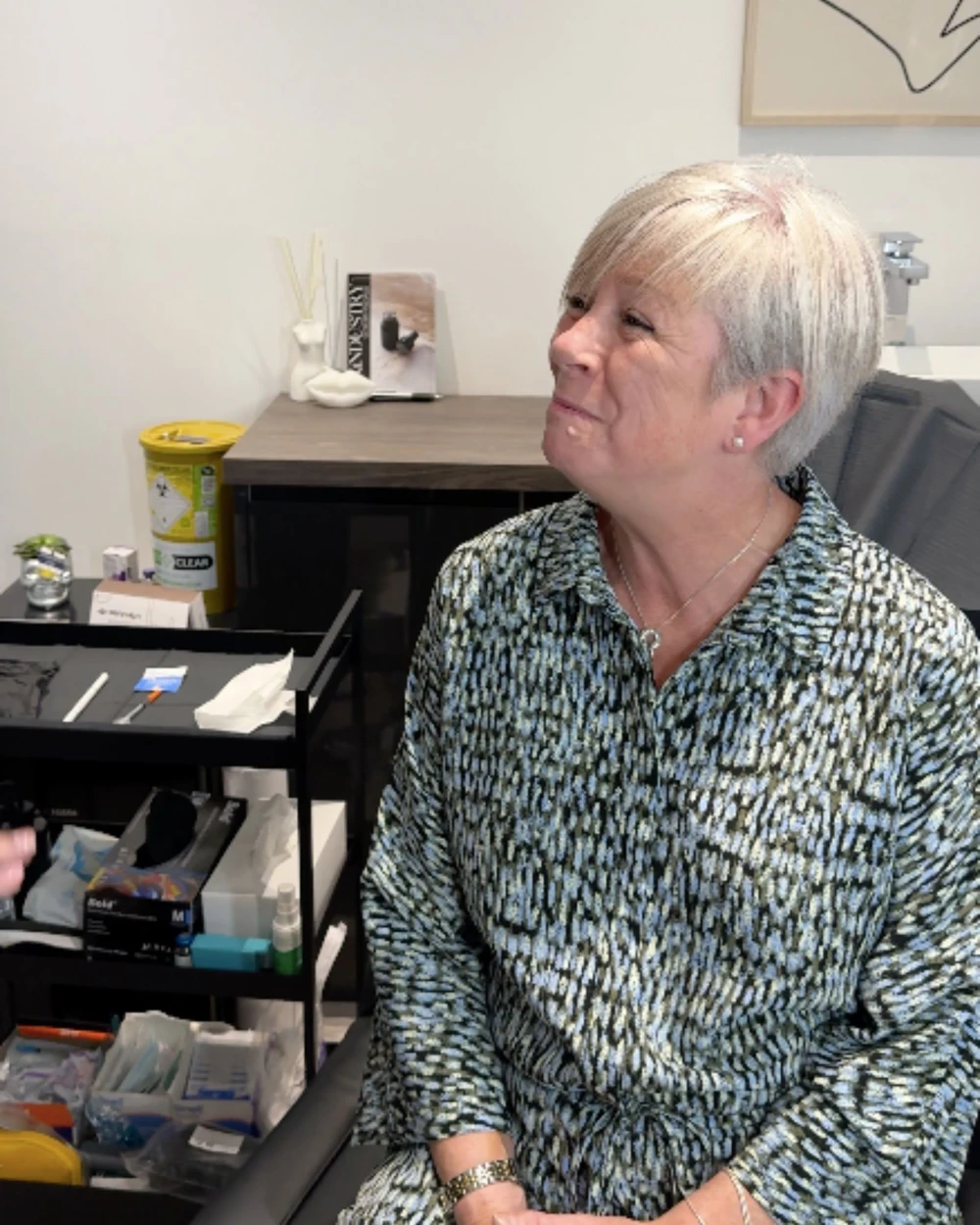 Candid patient interaction captured on a Dominate Dental content shoot day