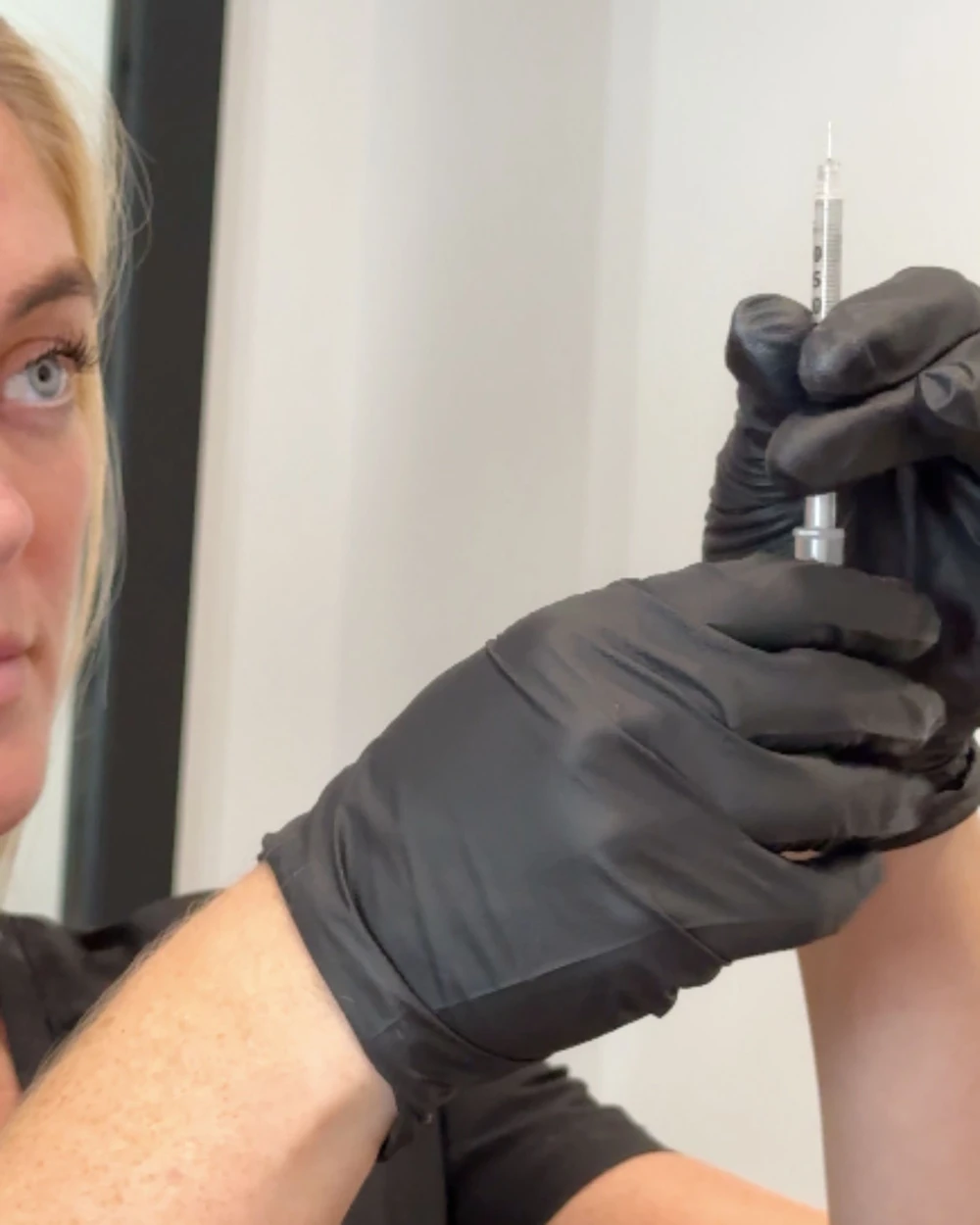 A treatment being administered, filmed for content on a shoot day